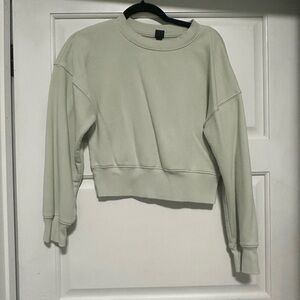 light green cropped sweatshirt